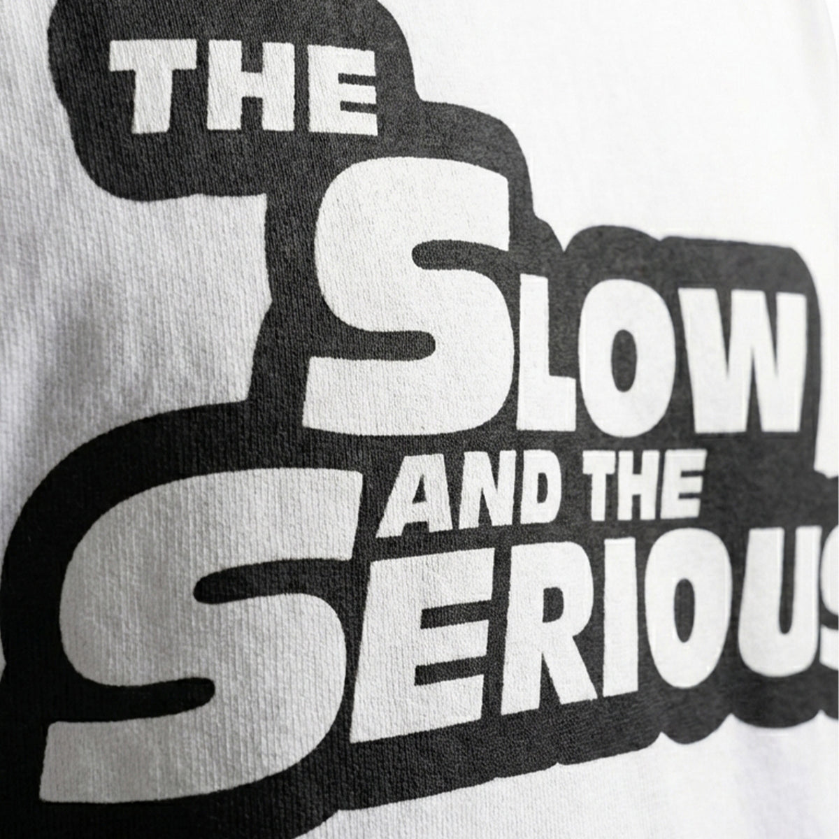 The Slow and the Seriousoversized cotton t-shirt for men and women by BOMBAE STORE