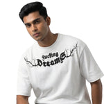 Sucking Dreamsoversized cotton t-shirt for men and women by BOMBAE STORE