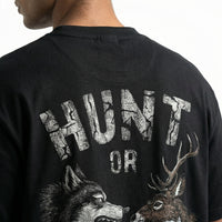 Huntedoversized cotton t-shirt for men and women by BOMBAE STORE