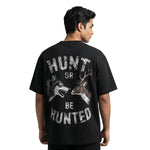 Huntedoversized cotton t-shirt for men and women by BOMBAE STORE