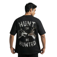 Huntedoversized cotton t-shirt for men and women by BOMBAE STORE