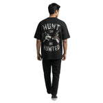 Huntedoversized cotton t-shirt for men and women by BOMBAE STORE